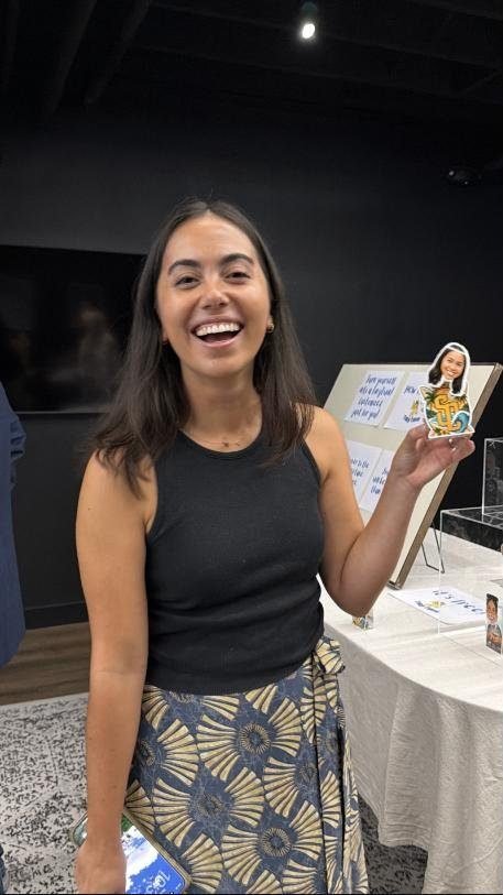 A guest holding their TinyTwin