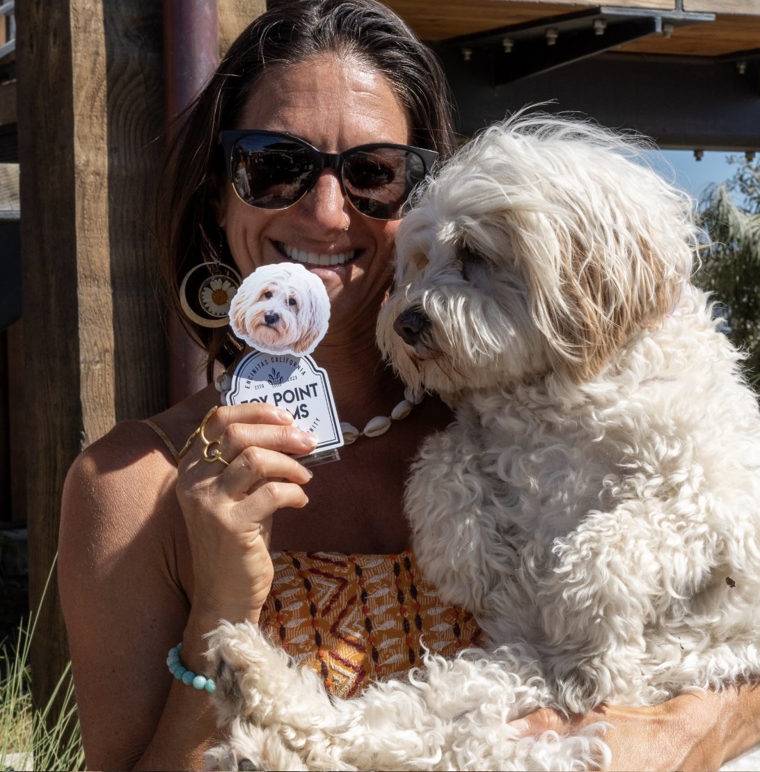 A guest holding their TinyTwin