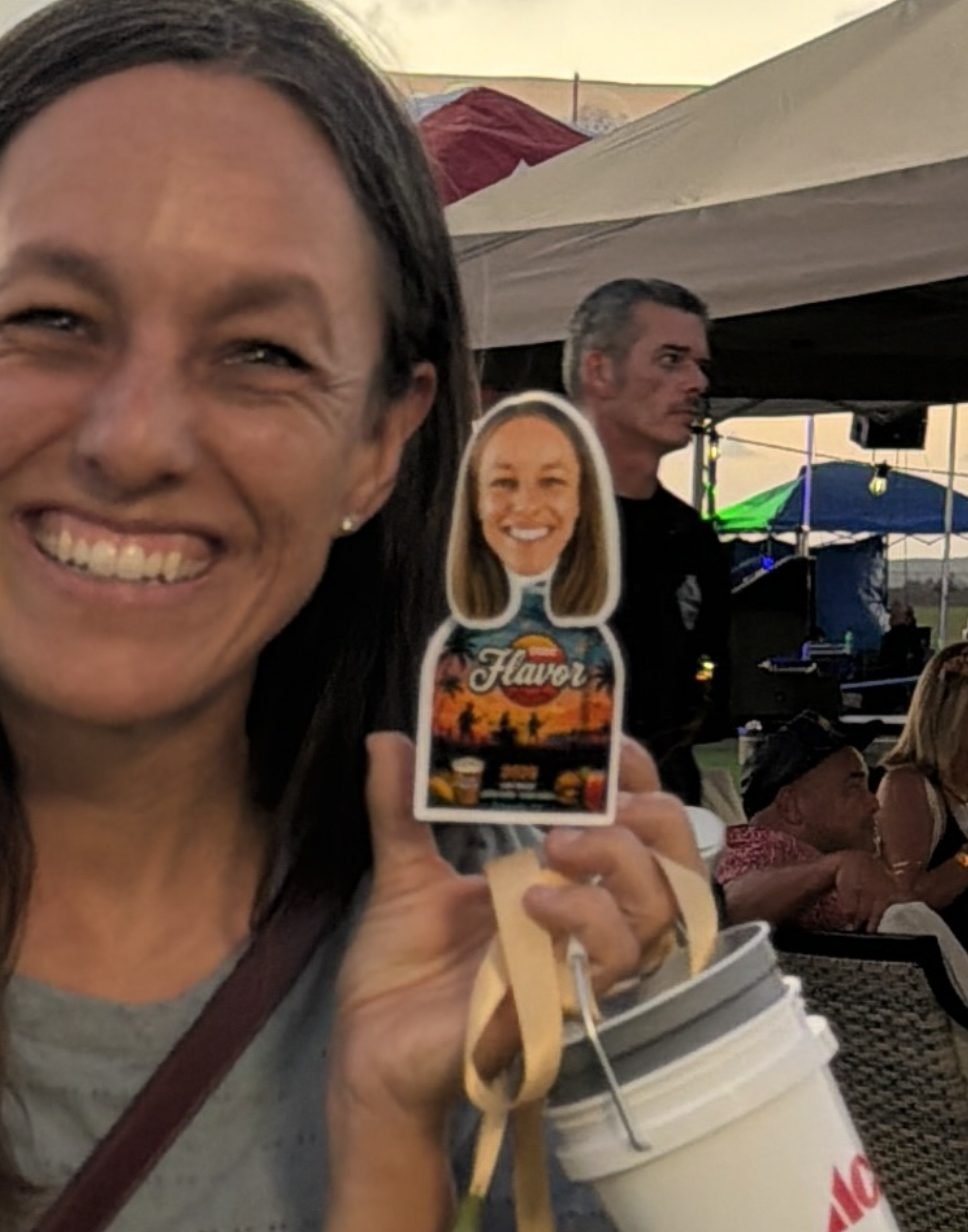 A guest holding their TinyTwin